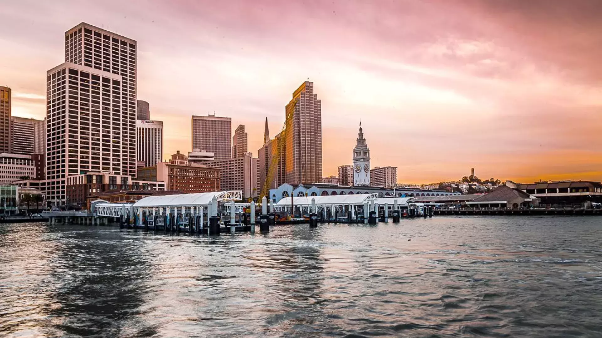 https://www.sftravel.com/sites/default/files/styles/hero/public/2022-11/embarcadero-sunset-ferry-building.jpg.webp?itok=xhO3f9xs