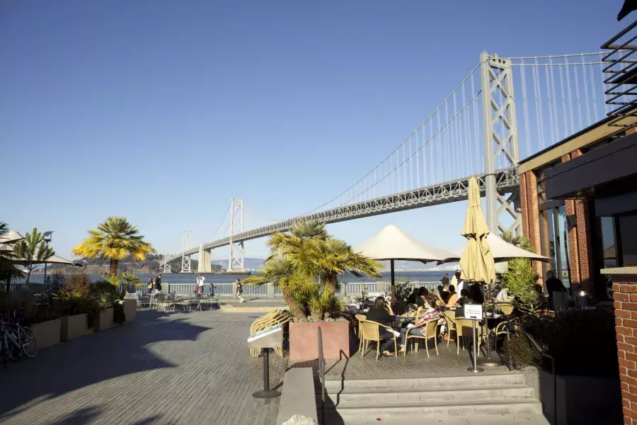 Diners enjoy a meal along the San Francisco waterfront.